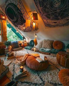 a room filled with lots of different types of pillows and lights on top of it