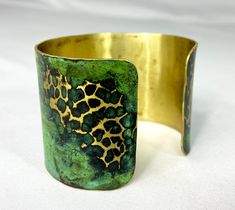 These unique, hand-formed copper and brass cuff bracelets with vibrant patinas create stunning accents to your personal style. Dress up or down- either way you'll be wearing an adornment that will turn heads, start conversations, and delight the eye of the beholder. This is a customizable hammered brass cuff with a gorgeous Tiffany or Light Green patina. Order yours in your favorite color, width and size (length). Tiffany tends to have marbled blues/teal and a little lighter green, whereas Green Brass Cuff Bracelet With Patina As A Gift, Adjustable Gold Cuff Bracelet With Patina, Unique Green Cuff Bracelet Bangle, Unique Green Cuff Bangle Bracelet, Unique Green Bangle Cuff Bracelet, Green Patina Cuff Bracelet Gift, Green Patina Cuff Bracelet As Gift, Unique Green Patina Cuff Bracelet, Handmade Brass Cuff Bracelet