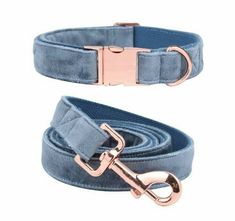 a blue velvet leash with rose gold buckles and a pink metal hook on the end