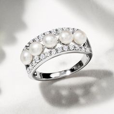 Ross-Simons - 4.5mm Cultured Pearl, .70ct t. w. White Topaz Ring in Silver. Size 6. Glisten and gleam with this nicely priced statement ring! A lustrous row of 4.5mm cultured freshwater button pearls is nestled between .70 ct. t. w. round white topaz borders, all set in polished sterling silver. 1/4" wide. White topaz and white pearl ring. Pearl birthstones are the perfect gift for June birthdays. White Pearl Ring, Pearl Birthstone, Ring Pearl, June Birthday, Topaz Ring, White Topaz, Pearl Ring, White Pearl, Cultured Pearls