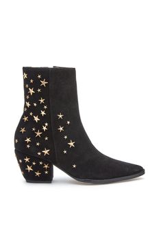 Our best-selling Caty boot embellished with star studs. Details: Suede upper Manmade outsole 2.5 in / 6.35 cm heel 7 in / 17.78 cm shaft height 10 in / 25.4 cm boot opening Textile lining Padded insole Zipper closure Imported *Measurements taken from size 8.5 US; Fits true to size. Please note: due to the nature of the leathers used on this style, each pair will look similar but not identical to the one pictured. These are considered natural variances and part of the intended look. Vintage Concert T Shirts, Star Boots, Upcycle Clothes Diy, Closet Shoes, Kawaii Accessories, Studded Boots, Rocker Chic, Upcycled Clothing, Witchy Woman