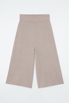 Knitted from premium merino wool, these modern culottes are comfortable yet refined. They come in a subdued beige tone and are shaped with an elasticated waistband and cropped, wide legs. Style them as a set with the coordinating sweater.  Regular fitThis product contains Responsible Wool Standard TE-00047206 (RWS) wool fiber from farms certified to animal welfare and land-management requirements  Shell: 100% Merino wool. Waistband: 87% Recycled polyester, 13% Elastane. Excluding trims / Machine Chic Beige Wide-leg Culottes, Beige Wide Leg Culottes For Workwear, Elegant High Waist Beige Culottes, Elegant Beige Wide Leg Culottes, Elegant Beige High-waisted Culottes, Elegant Neutral Wide Leg Pants For Loungewear, Casual Beige Wool Bottoms, Elegant Wool Bottoms For Loungewear, Spring Wool Beige Bottoms