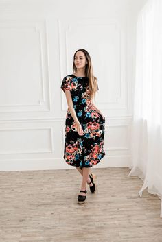 Floral dresses make perfect work outfits for spring and summer for women. This modest fashion one is casual and black with pockets and short sleeves. It is a great dress for church. #summerstyle #modestclothing Dress For Church, Black Floral Dresses, Outfits For Spring, Summer Work, Summer Work Outfits, Professional Attire, Black Women Fashion, Floral Dresses