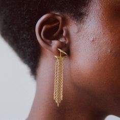 Build an earring that all you with mix + match styling. Choose your stud, then select your jacket and add-on more to wear however you want. Simple and sophisticated or standout and asymmetrical‚ the options are limitless. The Honi Fringe Jacket Earrings are a playful jacket-back to be worn with a stud earring. Handcrafted by artisans in Kenya with 24k gold plated brass using traditional techniques. Handcrafted in brass by artisans in Kenya. Gold products are 24k gold plated brass and match our b Chic Gold Ear Climbers, Edgy Single Ear Cuff, Chic Everyday Single Ear Cuff, Stackable Necklaces, Innovation And Entrepreneurship, Jacket Earrings, Stacked Earrings, Earring Jackets, Fringe Jacket