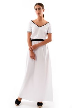 Effortlessly stylish white summer maxi dress with an elegant black trim - classic monochrome chic. Flattering v-neck design carried through to the back of the dress. Comfortable elasticated waist and gathered fabric design. Easily dressed down with trainers or up with heels and jewellery.  The sizing is generous. The small size is bust: 83-88cm, waist: 65-70cm, hips: 91-96cm with a little give either side. White Maxi Dress With Elastic Waistband For Summer, Elegant V-neck Maxi Dress With Elastic Waistband, Elegant White Dress With Elastic Waistband, White Maxi Dress With Elastic Waistband, Elegant White Maxi Dress With Elastic Waistband, Chic White Maxi Dress With Elastic Waistband, White V-neck Stretch Maxi Dress, White Stretch V-neck Maxi Dress, White Maxi Dress With Elastic Waistband For Daywear