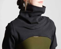 Functional Funnel Neck Winter Top, Functional Funnel Neck Tops For Fall, Functional Winter Tops With Funnel Neck, Functional Fall Tops With Funnel Neck, Fitted Winter Sports Sweatshirt, Black Knit Streetwear Tops, High Stretch Outdoor Tops For Fall, High Stretch Tops For Outdoor Fall Activities, High Stretch Tops For Outdoor Fall