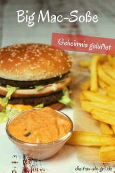 a hamburger and french fries on a table