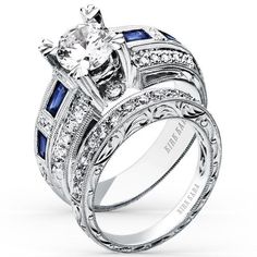 a diamond and blue sapphire wedding ring set with matching engagement bands on the band, in white gold