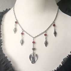 Beautiful handmade stainless steel bat necklace with red glass beads and a bat pendant hanging from a detailed silver-plated pearl. There are also 4 beautifully detailed antique-style charms attached.  Material chain: stainless steel  Other materials: silver-plated metal (lead and nickel-free), glass  Available in different lengths:  40 cm = approx. 15.8 inch  45 cm = approx. 17.7 inch  50 cm = approx. 19.7 inch  55 cm = approx. 21.6 inch  60 cm = approx. 23.6 inch  ( each necklace comes with a Vampiric Jewelry, Jewelry Vampire, Vampire Necklace, Bat Pendant, Victorian Necklace, Diy Jewelry Projects, Gothic Jewelry, Steel Necklace, Stainless Steel Necklace