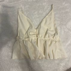 Never Worn Fits Like A Size Small Beige V-neck Crop Top For Spring, Beige Feminine Crop Top For Summer, Feminine Beige Crop Top For Summer, Feminine Cotton Crop Top For Vacation, Beige Cotton V-neck Crop Top, Summer Beige Tops For Daytime, Beige Tops For Daytime Summer, Beige Tops For Daytime Summer Wear, Cream Sleeveless Crop Top For Spring