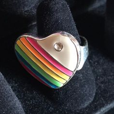 This is a necklace that emanates joy! I love the 1980s, hearts, and rainbows...so I'm on the lookout for pieces that combine all three of those elements and this was a rare find! There are very few of the authentic 80s rainbow jewelry pieces left these days. This ring has an adjustable band, so should fit most sizes! Please inspect the photographs thoroughly as this is a vintage item, which means often times the item is not perfect due to usage, and I do not offer refunds based on flaws that are Rainbow Teddy Bear, Rainbow Jewelry, Jewels Rings, Vintage Rainbow, Rainbow Heart, The 1980s, Portsmouth, 1980s Vintage, Not Perfect