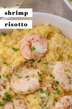 shrimp risotto in a white bowl with parmesan cheese and chives