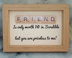 a scrabble frame that says friend is only worth 10 in scrabble but you are predicates to me