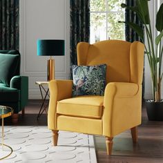 a living room filled with furniture and a green chair next to a window covered in curtains