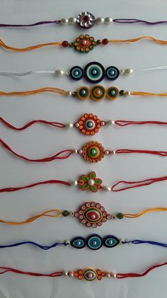 a collection of colorful beaded bracelets on display