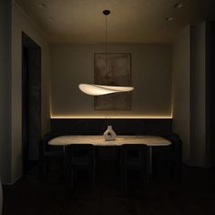 a room with a table and some lights