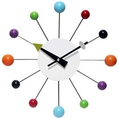 a clock with different colored balls on it's face and the hands are pointing upward