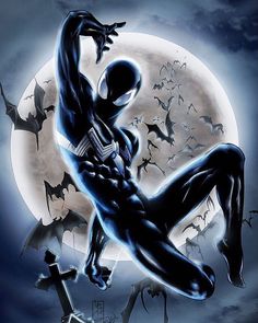 a man dressed as a black spider in front of a full moon with bats and bats