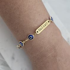 18k Evil Eye name Bar Bracelet  Jewelry Protection Bracelet custom Eye Bracelet  Blue Evil Eye bracelet Evil Eye Charm Dainty Charm Lucky  ★ GENERAL DESCRIPTION ★ Beautiful bracelet 18K Gold filled Stainless Steel Base with personalized engraving, you can place names, dates, initials or symbols. It is a perfect gift for best friends, couples, boyfriends or husbands, you can make a symbol of union with these beautiful bracelets. This chain bracelet gives the look of simplicity, stylish and bold. Chain bracelets make the perfect gift for yourself or someone special. The bracelet looks great on its own or layered. Each bracelet looks beautiful alone, but I personally love to layer these for the extra sparkle! ★ DETAILS ★ ⋆ 18k Gold Filled ⋆ 6 or 7 inch with 1-inch extender ⋆ Adjustable - fits Personalized 14k Gold Adjustable Bracelets, Customizable 14k Gold Bracelet Jewelry, Personalized Blue Bracelets, Customizable 14k Gold Bracelet, Customizable Adjustable 14k Gold Name Bracelet, Customizable 14k Gold Adjustable Name Bracelet, Adjustable Blue Jewelry With Custom Name, Blue Jewelry With Custom Name, Personalized Gold Plated Name Bracelet