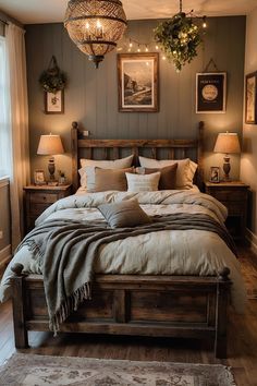 a large bed sitting in a bedroom next to two lamps