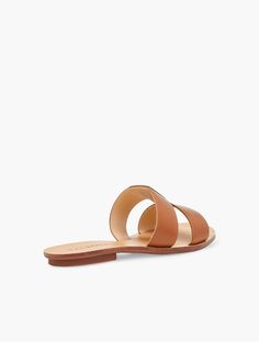 Luxe Vachetta leather slides. With geometric flair. A chic and easy go-to any day of the week. Features 1/3" heel Rubber sole Imported Material: 100% Leather | Hannah Vachetta Leather Slides Talbots Chic Brown Leather Slides, Modern Brown Slide Mules, Chic Brown Slides With Leather Footbed, Chic Leather Slide Mules, Trendy Brown Leather Slides, Chic Flat Leather Slides, Chic Leather Flat Slides, Modern Brown Flat Slides, Narrow Shoes