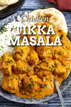 chicken tikka masala with rice on a plate