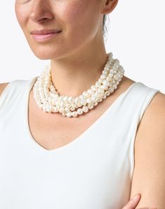 Make a statement with this stunning multi-strand fresh water pearl necklace by Kenneth Jay Lane. Featuring a gold-tone clasp this style is an instant classic. When it comes to pearls, don't be afraid to work in heirloom favorites from your collection-- this necklace looks fantastic layered with longer strands for a thoroughly modern look. Wear yours with a crew neck cashmere sweater and blue jeans for a for a chic, timelessly sophisticated look. Fresh Water Pearl Necklace, Water Pearl Necklace, Fresh Water Pearl, Freshwater Pearl Necklaces, Multi Strand Necklace, Kenneth Jay Lane, Strand Necklace, Be Afraid, Multi Strand