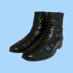 "Size 12 EE Vintage short black genuine leather men zip up ankle dress boots. These great boots were made in the 1970s in the United States. They were made by the Florsheim Company. They are 100% leather, upper and sole. These are so well constructed you only need to purchase one a lifetime. Size 12EE height: 8.25\" length: 12.75\" insole: 11.5\" width: 4.5\" heel: 1\" Material: leather  Color: black Condition: Good Vintage" Retro Formal Winter Boots, Fitted Vintage Boots For Business, Vintage Formal Boots For Winter, Vintage Round Toe Business Boots, Vintage Black Leather Chelsea Boots, Vintage Black Boots With Square Toe, Vintage Snip Toe Boots For Business, Vintage Snip Toe Business Boots, Vintage Business Boots With Plain Toe