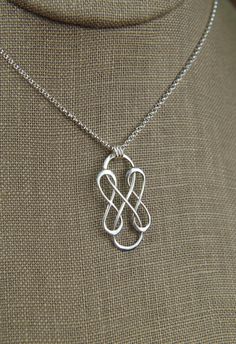 Triple infinity necklace in sterling silver, sterling silver necklace, infinity, eternity necklace, friendship, mother's day A sterling silver triple infinity symbol link that measures 1.18 x 0.59 inches (30 x 15mm) is suspended from a sterling silver chain with 3 jump rings and the chain can be any length up to 22 inches. It is secured with a sterling silver spring ring clasp. Your purchase will arrive in a jewelry box ready for gift giving or as a gift for yourself! Enter my shop here: jersey6 Cheap Infinity Shaped Jewelry Gift, Sterling Silver Infinity Necklace In White Gold, Modern Infinity Necklace As Gift, Silver Infinity Jewelry For Anniversary, Modern Twist Infinity Necklaces As Gifts, Modern Twist Infinity Necklace As Gift, Modern Twist Infinity Necklace For Gift, Modern Twist Infinity Necklace For Gifts, Nickel-free Silver Infinity Jewelry