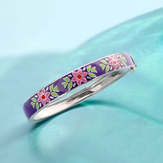 Ross-Simons - Purple, Multicolored Enamel Floral Bangle Bracelet in Silver. 8". An RS exclusive. Showing off a pretty backdrop of vibrant purple enamel, this colorful bangle bracelet also features bright flower motifs in fresh shades of multicolored enamel. Set in polished sterling silver. Hinged with a figure 8 safety. Box clasp, multicolored floral bangle bracelet. Multicolor Enamel Bangle Bracelets, Elegant Multicolor Enamel Bangle, Handmade Bangle Bracelets, Colorful Bangles, Safety Box, Flower Motifs, Bracelet In Silver, Vibrant Purple, Figure 8