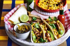 mexican food with corn and salsa on a plate