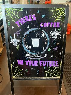 there's coffee in your future sign with spider webs and spooky decorations