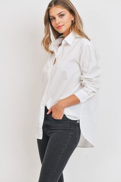 Loose Fit Long Sleeve Button Down Collared Boyfriend fit Rounded Hems Sizing: Small 2-4 Medium 6-8 Large 10-12 Model is wearing a size small Fits Loose White Boyfriend Shirt, Dressy Shirts, Cotton Poplin Fabric, Boyfriend Style, Boyfriend Shirt, Faux Leather Pants, American Shirts, Button Front Shirt, Boyfriend Fit