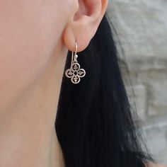 Four leaf clovers are traditionally considered to be good luck charms. Indulge in good fortune with these beautiful silver earrings, which also make the perfect present to anyone on your gift list. 925 Sterling silver High polish finish Approx. 1" L x 0.4" W Handmade in Taxco, Mexico Sterling Silver Cross Pendant Earrings For Gift, Elegant Hypoallergenic Cross-shaped Earrings, Elegant Hypoallergenic Cross Earrings, Minimalist Cross Pendant Earrings, Elegant Cross Earrings For Everyday, Elegant Hypoallergenic Cross Pendant Jewelry, Elegant Everyday Cross Earrings, Everyday Elegant Cross Earrings, Nickel Free Sterling Silver Cross Earrings