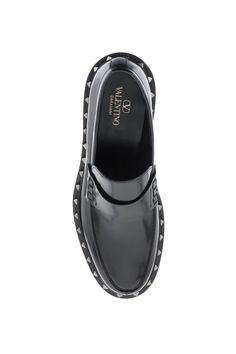 Valentini Garavani moccasins made of spazzolato leather with iconic ruthenium-finish studs applied to the outline. Leather lining and rubber sole. Moccasins Mens, Mens Black Leather, Spring Summer 2024, Leather Cap, Beach Tote Bags, Handbag Backpack, Lanvin, Summer 2024, Mens Shoes Sneakers