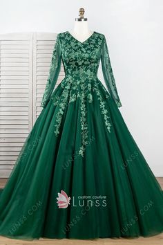 elegant dark green lace and tulle long formal ball gown Ball Gowns Dark Green, Long Sleeve Tulle Ball Gown With Sweep Train, Green Long Sleeve Prom Gown, Long Sleeve Gown For Debutante Ball, Elegant Long Sleeve Ball Gown For Quinceanera, Long Sleeve Prom Ball Gown With Sweep Train, Emerald Green Dress Long, Quinceanera Gowns, Purple Ideas