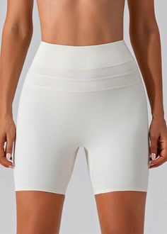 Key Features:
 Refined and Sculpted Silhouette : The "Short - Sculpt Vitality" redraws the silhouette with a precise sculpting effect, highlighting each curve with grace and offering a smooth and toned appearance.
 High Performance Design : Cut for movement, these shorts are ideal for any sporting activity, thanks to their comfortable high waist that stays in place and conforms to the shape of the body without tightening or slipping.
 Aesthetics and Functionality : Featuring a sophisticated desi Solid Sculpting Shapewear In Short Length, Sculpting Solid Shapewear Short Length, Sculpting Solid Shapewear In Short Length, Elegant White Smoothing Shapewear, White Stretch Shapewear, Elegant White Stretch Shapewear, White High Waist Smoothing Shapewear, White High Stretch Seamless Shapewear, High Stretch White Seamless Shapewear