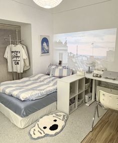 a bedroom with a bed and desk in it