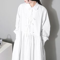 Item Code2329172672574Material63%Cotton,37%Complex FiberProduct Details:·Casual·Peter Pan Collar·Solid Color·Bowknot,Spliced·Long SleeveOne Size(Fit for EU 38-40,US8-10,UK12-14,AU12-14,NZ12-14)Length: 123.00 cm/ 48.43 "Bust: 118.00 cm/ 46.46 "Shoulder: 44.00 cm/ 17.32 "Sleeve Length: 61.00 cm/ 24.02 "The model height:5'5"/168cm,weight:108lb/49kgbust:86cm,waist:66cm,hips:88cmPS:1.The measurement is measured by hands,there will be 1 cm-3cm in error,hope you can understand.2.The product is taken in Casual White Midi Length Shirt Dress, Casual Long Sleeve Midi Dress For Daywear, Casual White Collared Dress, Casual Cotton Midi Dress With Tie Waist, Casual Relaxed Fit Shirt Dress With Tie Waist, Cotton Long Sleeve Shirt Dress With Tie Waist, Cotton Shirt Dress With Tie Waist And Long Sleeves, White Cotton Shirt Dress For Spring, White Long Sleeve Shirt Dress For Spring