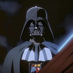 darth vader is looking at his cell phone in star wars the animated series