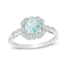 With touches of old and new, this vintage-inspired engagement ring captures her romantic style. Crafted in sterling silver, this lovely look showcases a 6.0mm cushion-cut lab-created icy-blue aquamarine wrapped in a frame of marquise and kite shapes adorned with sparkling diamonds and intricate milgrain detailing. Additional marquise shapes shimmer with petite diamonds and milgrain borders along the shank to complete this heirloom design. Captivating with 1/20 ct. t.w. of diamonds and a bright p Elegant Birthstone Ring With Rose Cut Diamonds For Promise, White Gold Birthstone Ring With Halo Setting For Wedding, Elegant Rose Cut Diamond Birthstone Promise Ring, Elegant Wedding Birthstone Ring With Halo Setting, Timeless Silver Halo Ring With Rose Cut Diamonds, Heirloom Halo Ring With Diamond Accents For Promise, Delicate Sterling Silver Diamond Ring For Formal Occasions, Delicate Silver Diamond Ring For Formal Occasions, Delicate Sterling Silver Rings With Diamond Accents