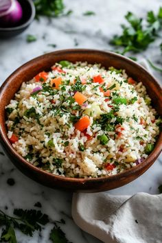 A wooden bowl filled with colorful vegetable rice, garnished with chopped parsley. Rice Meal Ideas, Rice Recipe Ideas, Flavorful Rice, Rice Meals, Healthy Rice Recipes, Stuffed Grape Leaves, Delicious Rice, Healthy Rice, Jollof Rice