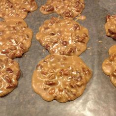 some cookies are sitting on top of a cookie sheet and ready to go into the oven