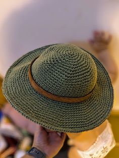 This handmade hat is the picture of versatility. Its cotton construction makes it soft, washable, light, and crushable! It can be stuffed in a backpack, thrown in the washer, rolled in the snow or mud, and will always bounce back to its original sturdy shape. The leather brim is removable for washing. Sized for babies between 6 months and 2 years, this hat fits a head circumference between 16 and 18 inches. Lightweight Comfortable Hat One Size Fits Most, Comfortable Lightweight Hat, Casual Crochet Bucket Hat For Travel, Lightweight Outdoor Hat One Size, Lightweight One-size Hat For Outdoor, Outdoor Wide Brim Hat One Size, Adjustable Brimmed Crochet Hat For Outdoor, Wide Brim Outdoor Hat One Size, One Size Crochet Hat For Outdoor