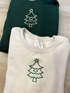 ✰COMES WITH TWO! Photo features: Forest Green X Tan Thread // Tan X Green Thread ✰Embroidered Matching Sweatshirts✰UNISEX✰Hand drawn and designed✰Super soft and comfy! *Sizes 2XL-3XL may be subject to longer processing times since we don't carry a large amount of inventory in those sizes, so we would have to put in a special order from our supplier! Thank you for understanding. Christmas Prints For Shirts, Cute Christmas Sweater Ideas, Diy Christmas T-shirt, Cute Christmas Hoodies, Green Embroidered Crew Neck Hoodie, Winter Sweatshirt Ideas, Winter Hoodie With Custom Embroidery In Relaxed Fit, Green Cotton Hoodie With Embroidered Graphics, White Embroidered Sweatshirt For Winter