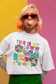 Step Back in Time with Our "This is my 90's T-Shirt" Digital Design! Get ready to relive the vibrant, fun-filled era of the 90's with our exclusive digital t-shirt design! This colourful masterpiece features iconic images that defined a generation: rollerblades, funky sunglasses, a nostalgic cassette tape, and even a retro cubic block. Bursting with bright hues and playful energy, this design captures the essence of 90's pop culture. Perfect for those who want to add a touch of nostalgia to thei 90 Art, Style 90's, Fashion Png, 90s Pop Culture, Funky Sunglasses, Iconic Images, 90's Fashion, Cassette Tape, Mode Vintage