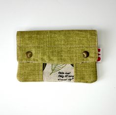 The wallet/purse is a perfect complement for your money, coins and cards that you carry every day. It has a zipper closure, allowing you to put your money and cards neatly. In addition, it has two snap buttons that give you more security. Its design is modern, timeless and functional. The colors are warm, beautiful and combinable. MEASURES: Height - 10 cm approx. Width - 15 cm approx. MATERIALS: Exterior - Durable upholstery fabric. metal snaps Interior - Printed cotton fabric. TAKE CARE OF YOUR Green Zipper Coin Purse For Travel, Green Travel Coin Purse With Zipper, Green Coin Purse With Removable Pouch For Travel, Green Wallets With Interior Card Slots, Everyday Green Wallets With Interior Card Slots, Green Bags With Coin Pocket For Daily Use, Green Zipper Pouch Wallet For Travel, Clutch Coin Purse With Zipper Pocket As Gift, Clutch-shaped Coin Purse With Zipper Pocket As Gift