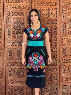 -This Beautiful Long Mexican Colorful Floral Dress is the perfect dress for a fun night out or a special event. -It is full of colorful embroidered flowers and has some crocheted details. -This dress has ties on the back in order to adjust the fit. - You can purchase the dress either with or without the belt. Please note: The accesories shown with this dress may purchased as well and Can be found in this links Earrings:https://www.etsy.com/es/listing/855938626/aretes-mexicanos-de-filigrana-arete Mexican Traditional Dress, Mexican Bridesmaid Dresses, Colorful Floral Dress, Traditional Mexican Dress, Mexican Embroidered Dress, Mexican Dress, Plunge Dress, Mexican Dresses, Floral Embroidered Dress