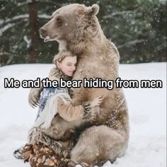 a woman hugging a bear in the snow with words on it that read me and the bear hiding from men