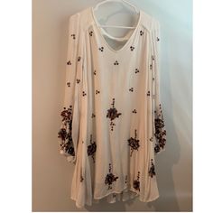 Free People Floral Dress, Never Worn White Tunic Fall Dresses, White Tunic Dress For Fall, White Floral Embroidered Dresses For Fall, Boho Print Tunic Dress For Brunch, Spring Boho Print Rayon Dresses, Brunch Boho Print Tunic Dresses, White Long Sleeve Rayon Dress, Spring White Boho Print Mini Dress, White Boho Print Mini Dress For Spring